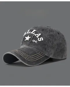 Close-up of vintage washed baseball cap with Dallas 1841 embroidery and star patch detail