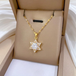 Exquisite gold snowflake pendant necklace with cubic zirconia in a jewelry gift box