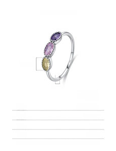 Detailed view of S925 silver ring with 3x5mm purple, pink and yellow oval crystals