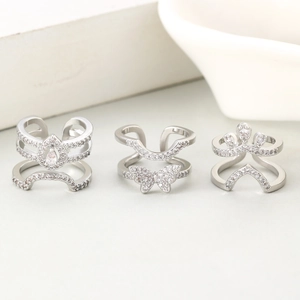 Three-piece silver nail ring set with butterfly, teardrop and crown designs in pavé zircons