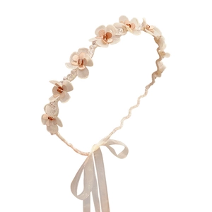 Elegant white lace headband for girls featuring pink fabric flowers and white ribbons