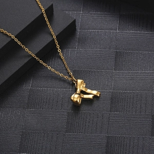 Polished gold butterfly bow pendant on dainty titanium steel chain for daily wear