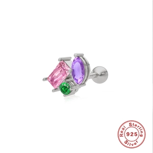 Macro detail of S925 sterling silver stud earring featuring colorful zircon stones and screw back