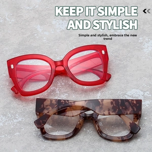 Flat lay of red and tortoiseshell oversized square anti-blue light glasses with simple style