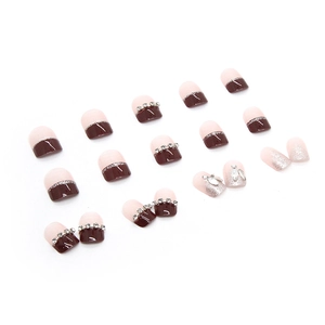 Elegant wine red French press-on nails with mother-of-pearl, chains, and glitter crystals