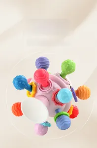Detail view of colorful silicone sensory ball with textured loops and suction cup base