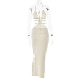 Detail view of the open-back knit hollow-out dress with halter tie design in beige