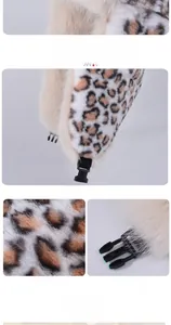 Detail of plush leopard print trapper hat featuring windproof buckle and warm lining