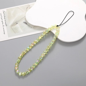 Colorful iridescent heart-shaped beaded phone charm wrist strap in a gradient yellow-green