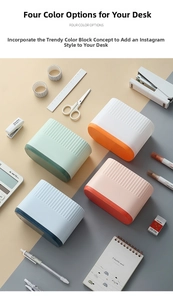 Top view of two-tone desk organizers with vertical stripes and various office stationery