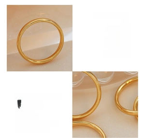 Detail showing 18K gold plated titanium steel rings in stacked and single views