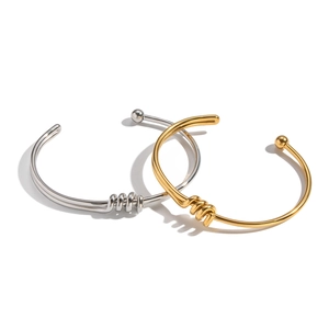 Minimalist twisted knot open cuff bracelets in polished gold and silver stainless steel