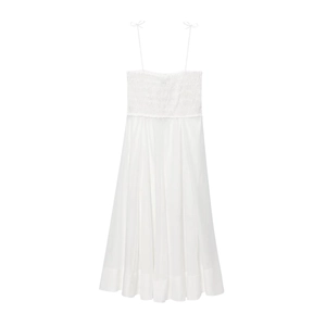 Detail of white midi dress featuring pleated bodice, thin straps, and A-line silhouette
