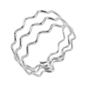 Detailed close-up showing the unique triple-layer wavy texture of the silver ring