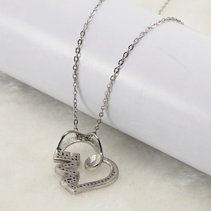 Polished silver stainless steel heart necklace back view with LOVE letter engraving