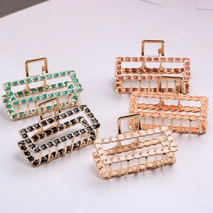 Set of five large alloy hair claws in assorted colors with a metal chain square design