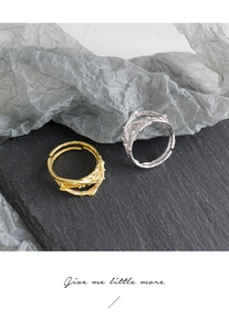 Detail of irregular thorn texture on S925 sterling silver rings in gold and silver finish
