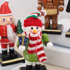 Handcrafted wooden snowman nutcracker soldier with gift box for Christmas desk decor