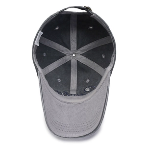 Inside view of washed cotton baseball cap with six-panel stitching and metal buckle