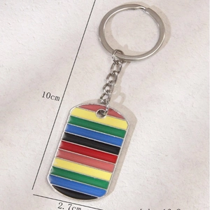 Retro shield keychain with colorful enamel stripes and metal ring measuring 10cm