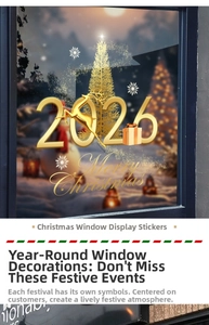 Detail of golden 2026 Christmas window decals with reindeer and snowflake patterns