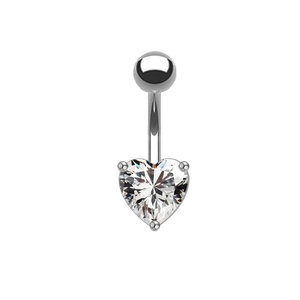 Macro shot of silver heart-shaped zircon piercing jewelry with a polished metal finish