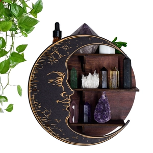 Three-tier moon-shaped wooden shelf with gold celestial carvings and crystal display