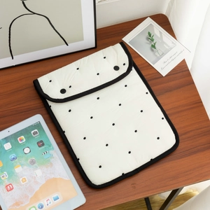 Padded white polka dot laptop sleeve for 11 and 13 inch tablets with dual snap buttons