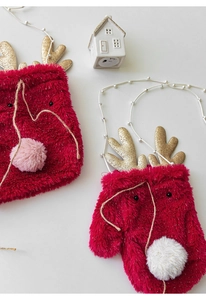 Detail of red plush reindeer gift bags with golden sequins and white pearl straps