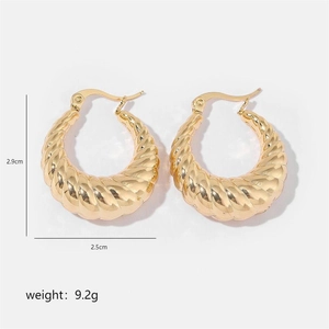 Detail view of gold hoop earrings with dimensions 2.9cm x 2.5cm and weight 9.2g