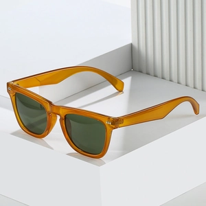 Classic square retro sunglasses with amber transparent frame and metal rivet details