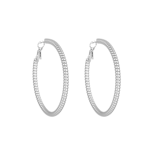 Macro detail of silver spiral textured hoop earrings in polished stainless steel finish