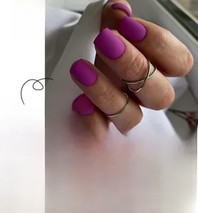 Matte purple press-on nails in short square shape with a smooth frosted finish