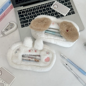 Detail of plush animal pencil cases showing large capacity for storing various stationery items