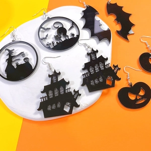 Halloween acrylic earring set featuring black bat, cat, pumpkin, and castle charms