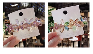 Detailed view of large butterfly crystal hair clips with colorful gradient rhinestones