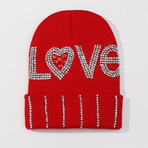 Winter red knitted beanie with LOVE rhinestone embellishment and sparkling accents