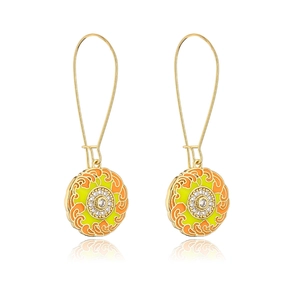 Macro detail of 18K gold plated drop earrings with orange enamel and cubic zirconia