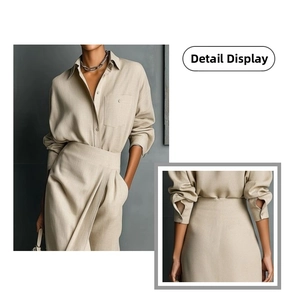 Detail view of khaki linen-texture two-piece set featuring shirt pockets and cuff stitching