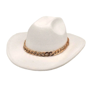 Close-up of white wool fedora hat featuring a chunky gold chain accessory detail