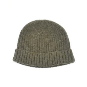 Close-up of olive green ribbed knit beanie with soft texture and wide fold-over cuff