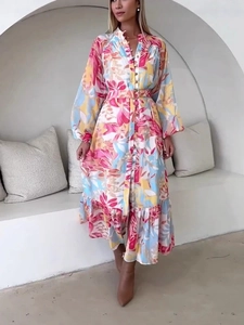 Elegantes Midikleid mit Blumenmuster, Puffärmeln und Taillengürtel in kräftigen Farben