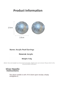 Detail view of 2.5cm silver sphere stud earrings featuring textured acrylic finish