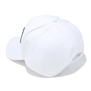 Detail of white baseball cap showing durable cotton twill fabric and adjustable snapback