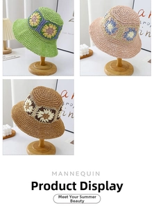 Detail of hand-crocheted sun hats with sunflower patterns and hollow weaving texture
