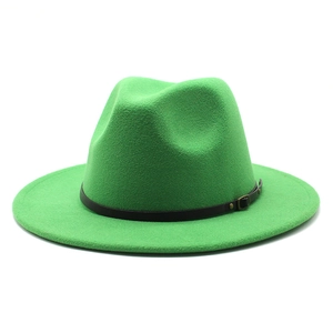 Detail of bright green wool fedora hat featuring a vintage leather belt and metal buckle