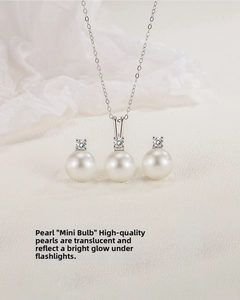 Detailed close-up of S925 silver pearl jewelry set with necklace and stud earrings