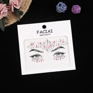 Macro view of pink crystal face jewels and rhinestones for party makeup and eye decoration
