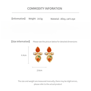 Size specifications for vintage alloy earrings with cat's eye stone and faux pearls