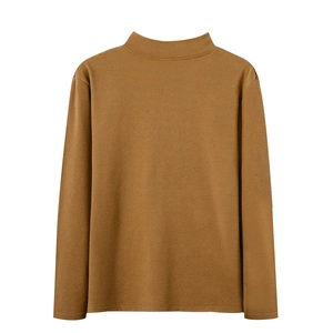 Detailed texture of men's long sleeve mock neck thermal shirt in khaki brown fleece fabric